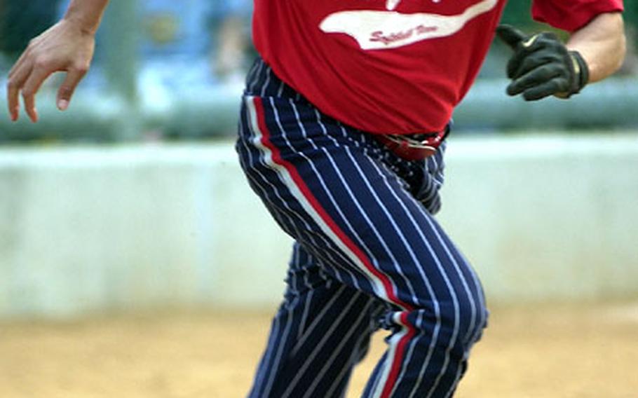 Danny Acosta of Okinawa&#39;s Pacific Force runs out his run-scoring single in the fifth inning of a 20-19 win over Korea&#39;s Kunsan Wolfpack during Friday&#39;s round-robin play in the 13th CASS Pacificwide Invitational Interservice Softball Tournament at Lombardo Field, Yongsan Garrison South Post, South Korea. Acosta, an Air Force tech sergeant stationed in the Pacific much of his career, flew all the way from Uzbekistan, where he was deployed for five months, to play in the tournament.