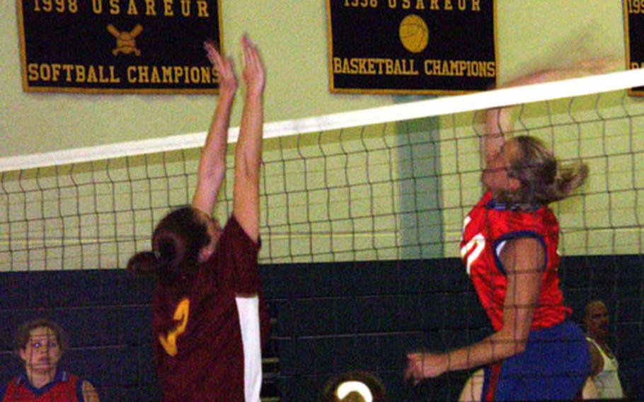 Bamberg&#39;s Debra McNamara generates some arm speed as she makes a kill over Vicenza&#39;s Candida Kilgore during Bamberg&#39;s 25-15, 25-17 pool-play victory Friday in the 2003 Army-Europe volleyball tournament at Patton Barracks in Heidelberg. The tournament continues through Sunday.