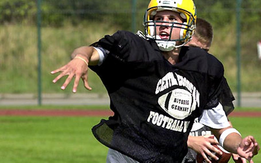 Ryan Rice of SHAPE releases a pass during a session at the European Football Camp in Bitburg, Germany.