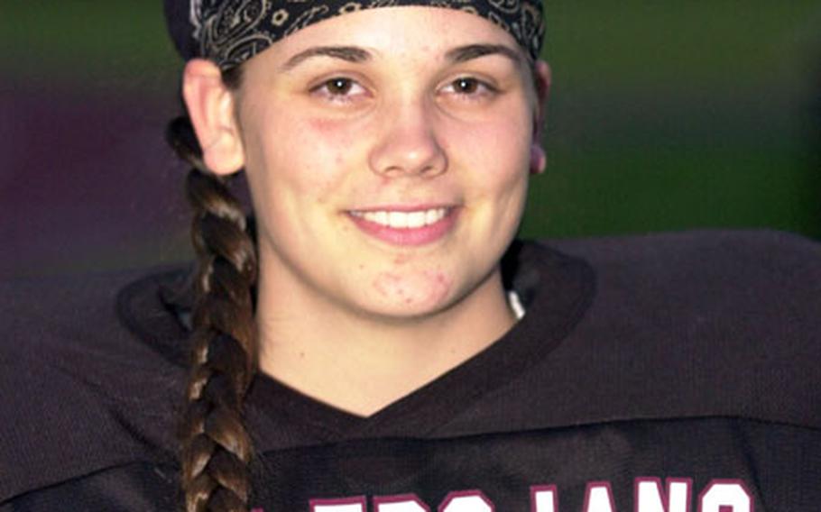 Zama American senior tailback Monica Holman is the first female player to score a touchdown in a Far East high school game.