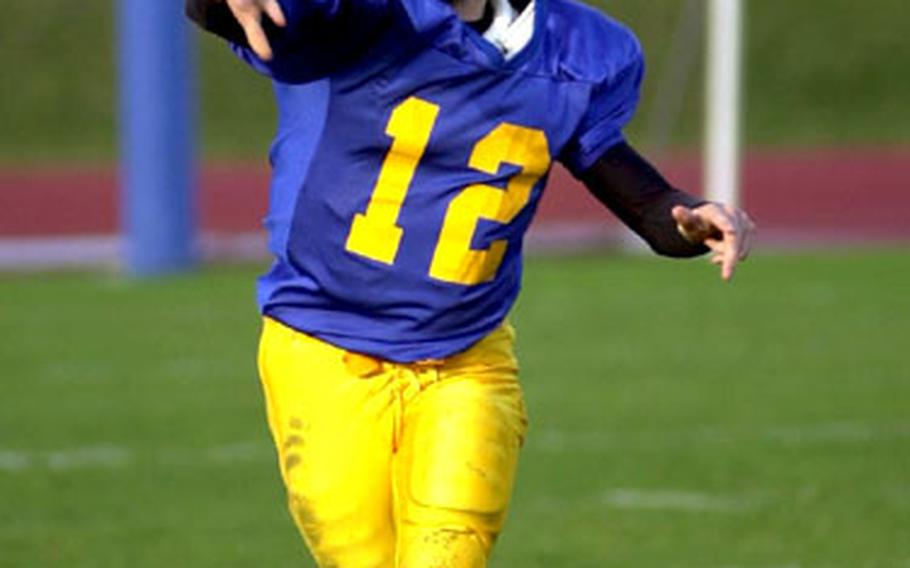 Ansbach quarterback Shawn Bachtel throws a screen pass during Ansbach&#39;s 24-6 victory over Baumholder in the Div. III championship game last November.