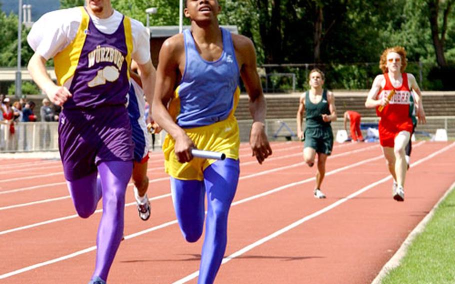 Just a few meters before the finish line in the boys 1,600-meter sprint medley, Würzburg&#39;s Robert Fleck, left, and Ansbach&#39;s Victor Green, right, were neck and neck. In a photo finish, Fleck pulled ahead to give Würzburg the win by 1/100 of a second. Würzburg&#39;s winning time was 3:50.67.