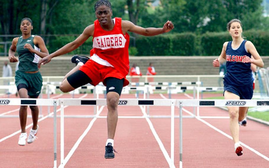 Kaiserslautern&#39;s Lynndsey Hyter reaches the final hurdle in the girls 300-meter event Saturday at the European Track and Field Championships in Wiesbaden, Germany. The sophomore won in a time of 48.44.