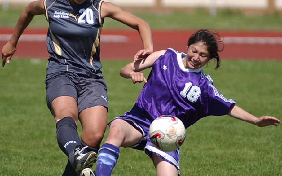 Heidelberg&#39;s Denisse Rivera, left, and Würzburg&#39;s Jane Castillo battle for the ball Saturday during a DODDS high school soccer match in Heidelberg, Germany. Castillo&#39;s foot and hand were injured on the play and she left the game in an ambulance. She was treated at the U.S. Army hospital in Heidelberg and released.