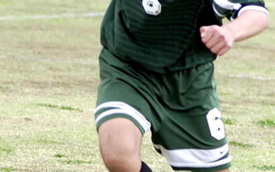 Daniel Sanchez of Edgren Eagles moves the ball against Kinnick.