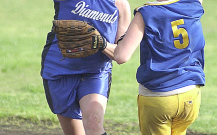 Misawa Diamonds shortstop Sarah Campbell (25) tosses a relay throw past Yokota Panthers baserunner Jenna Koning (5) during Saturday&#39;s championship game in the 2004 Department of Defense Dependents Schools-Japan Invitational Girls Softball Tournament at Ranger Field, Atsugi Naval Air Facility, Japan.