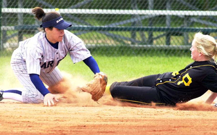 Patch&#39;s Marilyn Martin (right) slides into third under the tag by Bitburg&#39;s Monica Bintz during Saturday&#39;s DODDS Division II European softball championship.