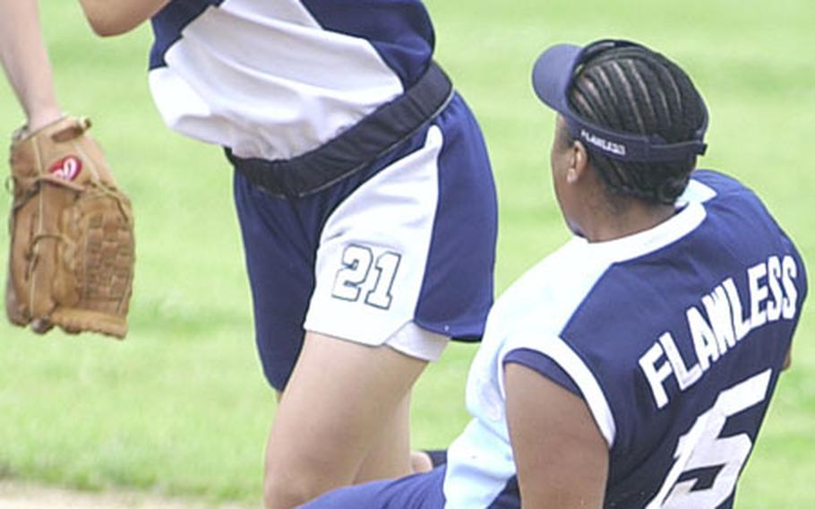 Second baseman Jane Chai of the Seoul American High School Falcons sidesteps a sliding Joy Morgan of the Osan Air Base Mustangs during Saturday&#39;s round-robin play in the 14th Pacificwide Open Softball Tournament at the Lombardo Field FourPlex, South Post, Yongsan Garrison, South Korea.