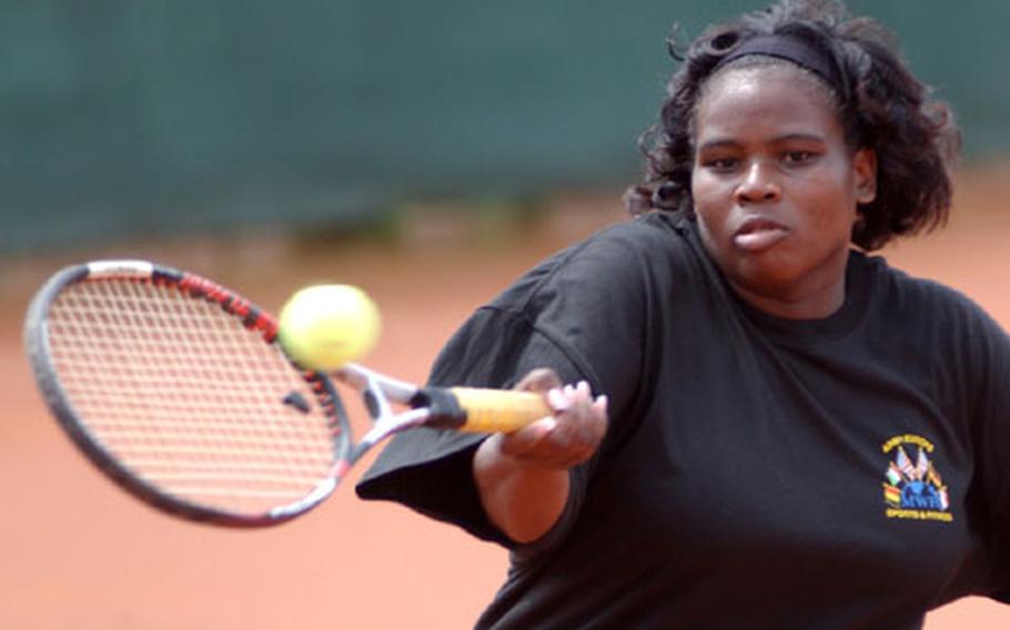 Philisa Legrier hits a forehand winner during the womens doubles final match at the U.S. Forces Europe Tennis Championship in Heidelberg, Germany, on Sunday.