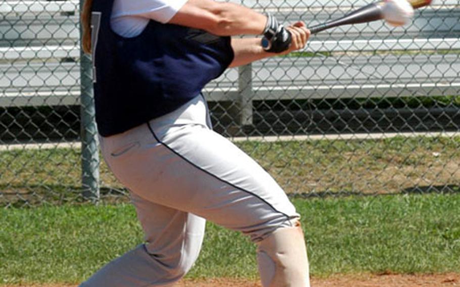 Lakenheath’s Kathy Trim drills a base hit during Thursday’s championship game of the U.S. Air Forces in Europe women’s softball tournament. Ramstein won the game, 9-5.