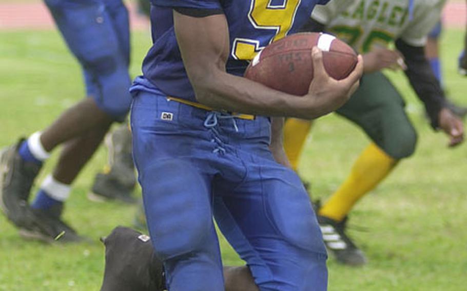 Yokota Panthers running back Chris Roach runs untouched into the end zone against the Robert D. Edgren Eagles during Saturday&#39;s Japan Football League season opener at Bonk Field, Yokota Air Base, Japan.