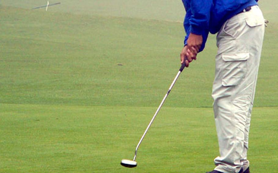 Defending champion Gilbert Mendez of Rota rolls a birdie try just past the 18th hole Thursday en route to a 10-over 81 and a two-stroke lead over teammate Jason Allard and Ramstein&#39;s Chris Hustead going into today&#39;s final round of the 2004 DODDS-Europe high school golf championships at the Rheinblick Golf Club.