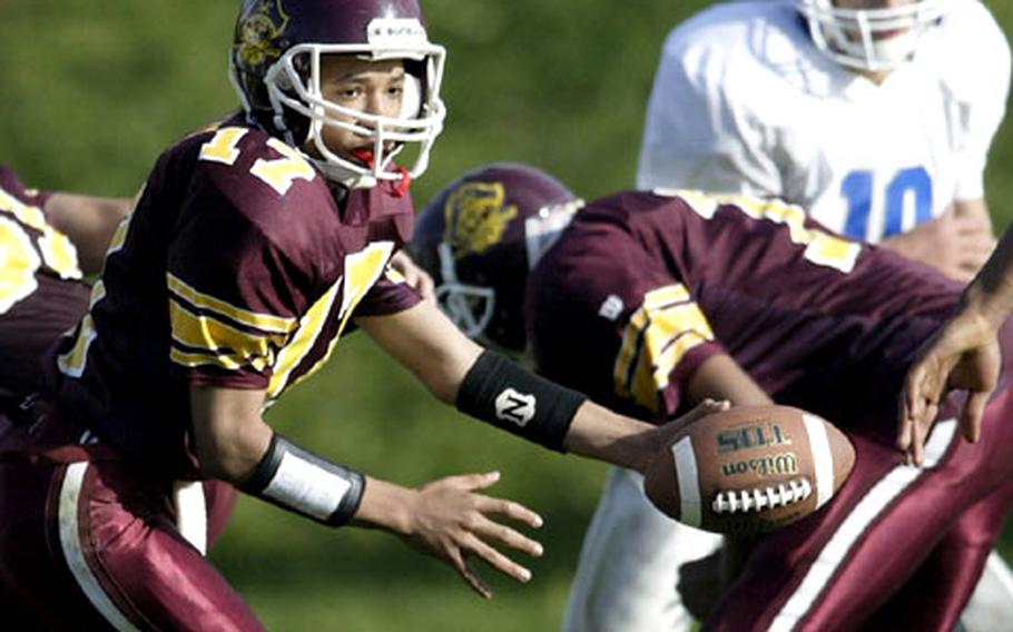 Baumholder&#39;s Chris Bray looks to hand off the ball during Saturday&#39;s game.