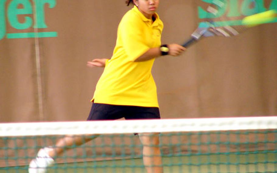 Christel Lomahan of Hanau runs into a backhand return Thursday during her 8-1 consolation-round loss to Marianna Vertrudez of Alconbury on the opening day of the three-day 2004 DODDS-Europe tennis championships at the Tennis Center Vitis in the Wiesbaden suburb of Nordenstadt. The tournament ends Saturday.