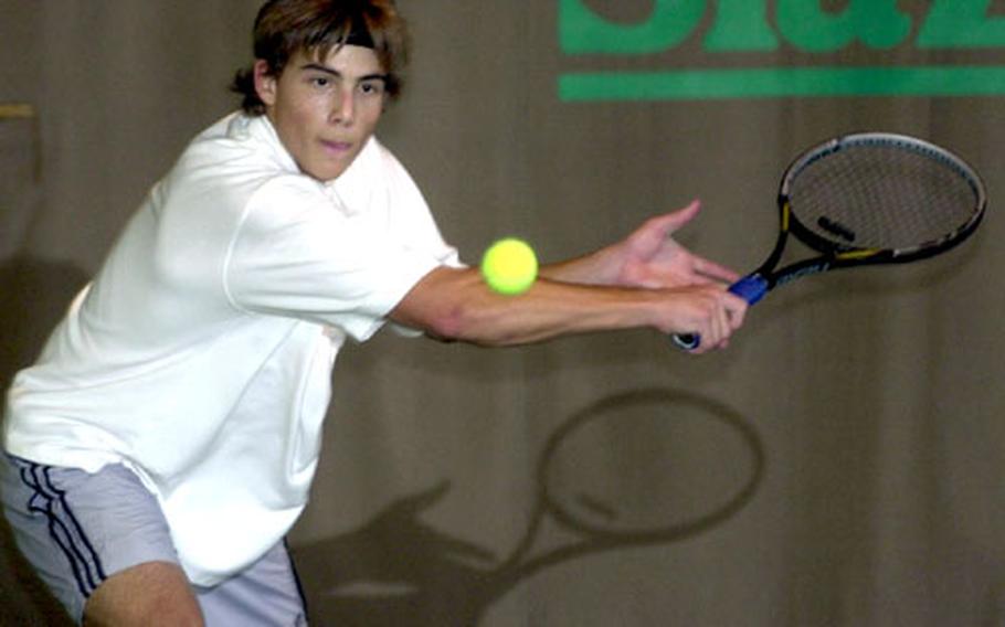Ankara&#39;a Adam Beveridge lunges to return the serve of ISB&#39;s Jun Koide during their semifinal match at the DODDS European Tennis Championships in Wiesbaden-Nordenstadt, Germany, on Friday. Koide defeated Beveridge 6-3, 6-3.
