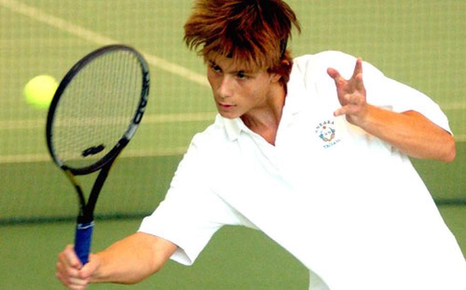 Ankara&#39;a Adam Beveridge goes to the net for a shot against ISB&#39;s Jun Koide during their semifinal match.