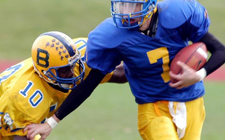 Bamberg&#39;s Marvin Gholston closes in for a tackle on Ansbach quarterback Brandon Bachtel during Division III semifinal Action in Katterbach, Germany on Saturday.