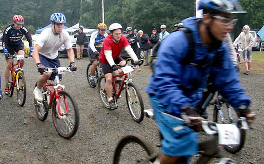 The Men&#39;s Open division takes off in the Tour De Tama XV mountain bike race at Tama Hills Recreation Center, Tokyo, on Saturday.