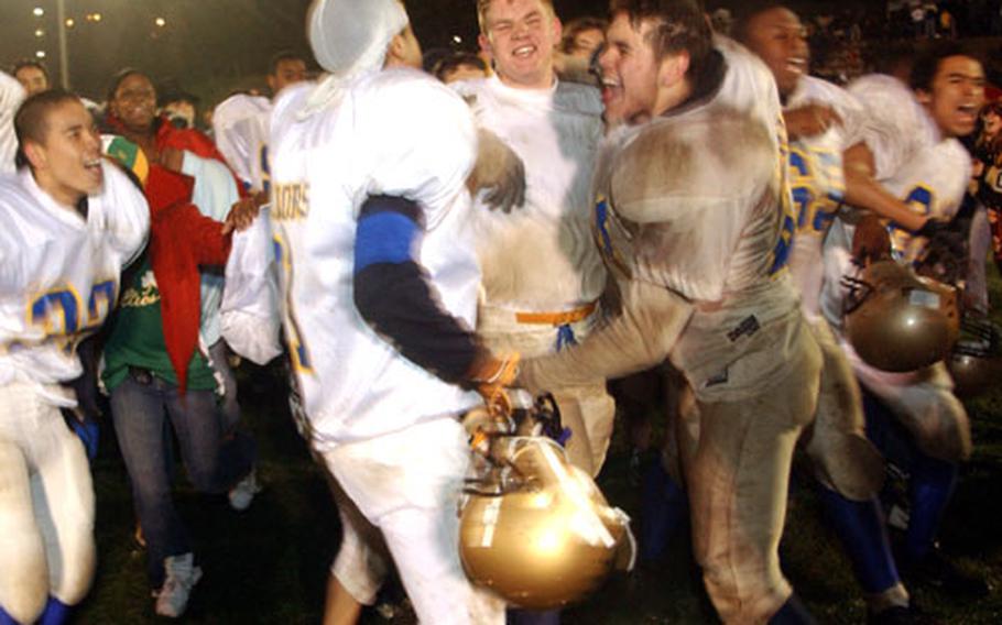 Wiesbaden players and fans celebrate their 37-7 victory over Heidelberg.