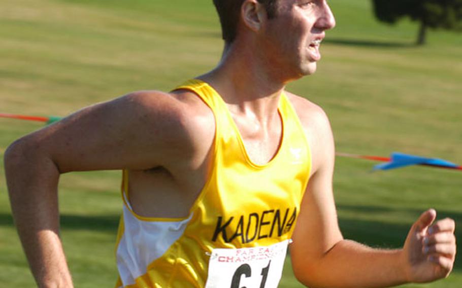 Kadena senior Jon Turner flies through the finishing chute during Monday’s Far East cross country meet at Gosser Memorial Golf Course, Misawa Air Base, Japan. He finished in a winning time of 17:31, edging Justin Biskup of Matthew C. Perry by one second.