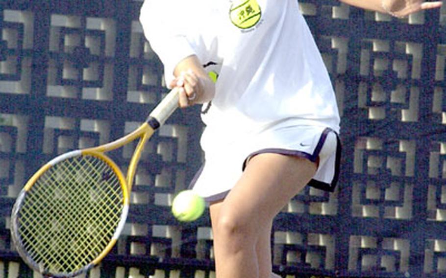 Sophomore Amy Lopes of Kadena readies a forehand return against her senior teammate Lori Kanikkeberg during Friday&#39;s girls singles championship in the 2004 Far East High School Tennis Tournament. Lopes beat Kanikkeberg 6-2, 6-2.