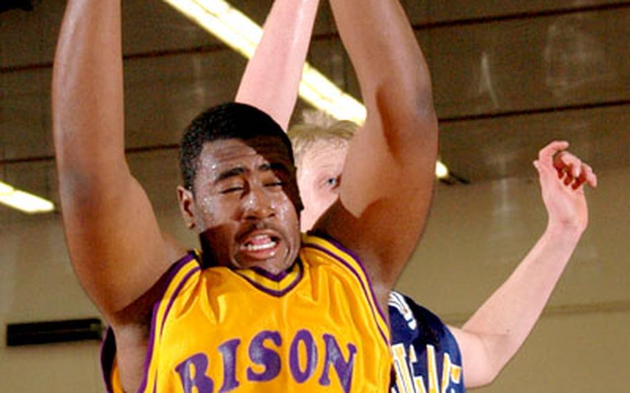 Mannheim&#39;s Earl Lee boxes out Ansbach&#39;s Tyler Sherman and grabs a rebound.