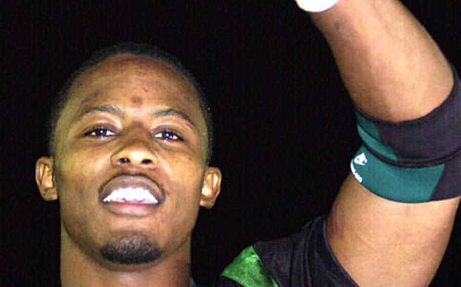 League MVP Trent Beavers of the Kadena Dragons flashes the No. 1 sign after Saturday&#39;s championship game.