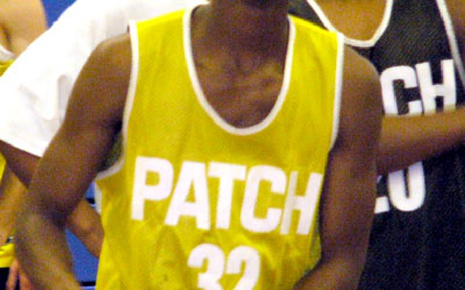 Patch High School senior Neal Griffin eyes the rim during shooting practice Monday in Vaihingen, Germany. “He’s a streaky shooter,” said Mannheim coach John Crockett, whose Bison defeated Patch 72-60 on Friday night despite 28 points by Griffin. “When he’s hot, there’s very little you can do to stop him.”