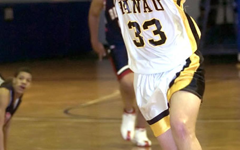 Hanau&#39;s Marcus Fontanez passes after picking up a loose ball at midcourt during Friday&#39;s game.