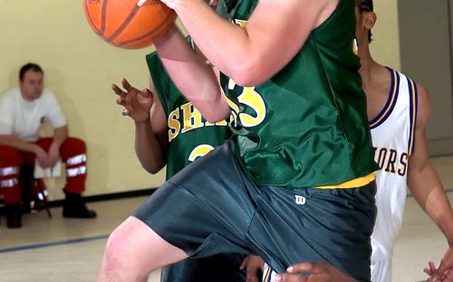 SHAPE&#39;s Kodiak Reed goes strong to the hoop for a layup Friday against Wiesbaden.