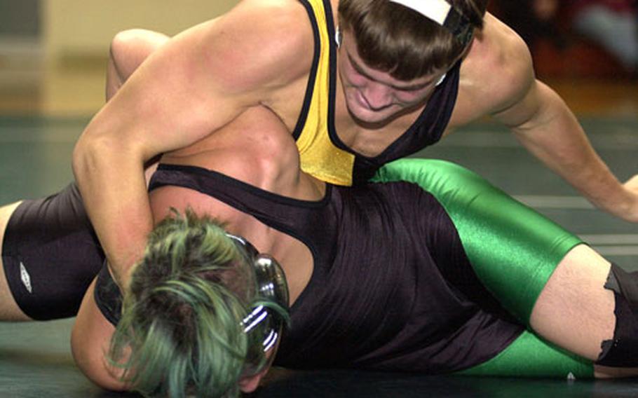 Kadena's Devon Copeland, top, is one of eight reigning Far East champions competing in Saturday's Nile C. Kinnick "Beast of the East" Tournament.