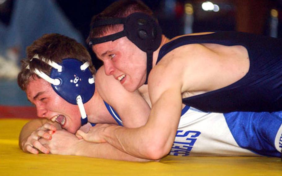 Gary Vogt of Aviano, top, beat Paul Moseman of Brussels in the 119-pound final.