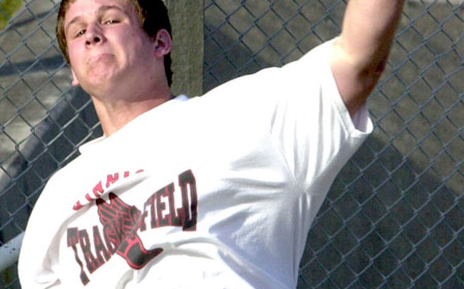 Joel Pettigrew of Nile C. Kinnick in Japan competes in the shot put at the 3rd Alva W. "Mike" Petty track and field meet Friday at Camp Foster, Okinawa. Pettigrew finished third with a heave of 40 feet, 7½ inches.