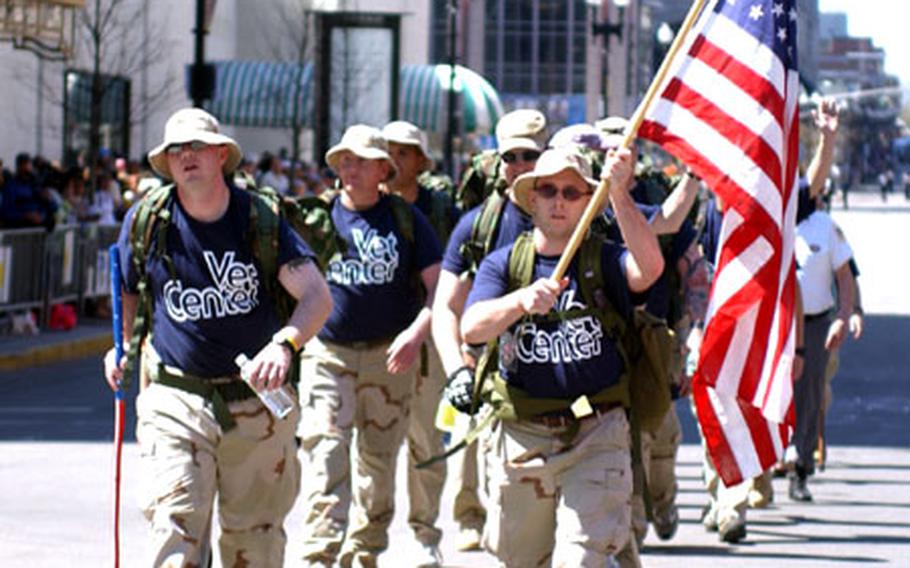 Veterans from the Hartford and Manchester, Conn., veterans centers near the end of their 26.2-mile ruck march in Boston on Monday.