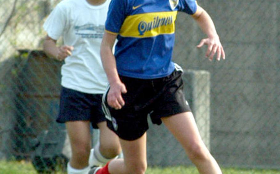 Aviano High School freshman Anna Schrader dribbles during a recent practice. In three games this season, Schrader has recorded seven goals and four assists.