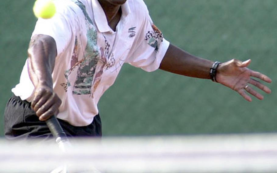 Roy Tannis of Darmstadt returns a shot from Bamberg&#39;s Jamie Rydell on his way to winning the United States Forces Europe men&#39;s open tennis crown.