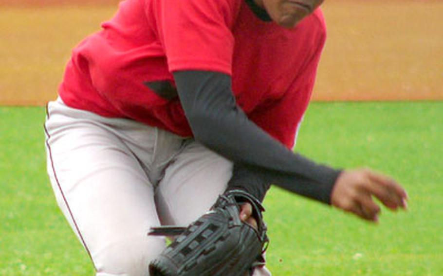 England reliever Marshal Todman tosses a pitch during his team&#39;s 6-3 loss to Spain Wednesday in the Little League Baseball&#39;s TransAtlantic Regional at Vilseck, Germany.