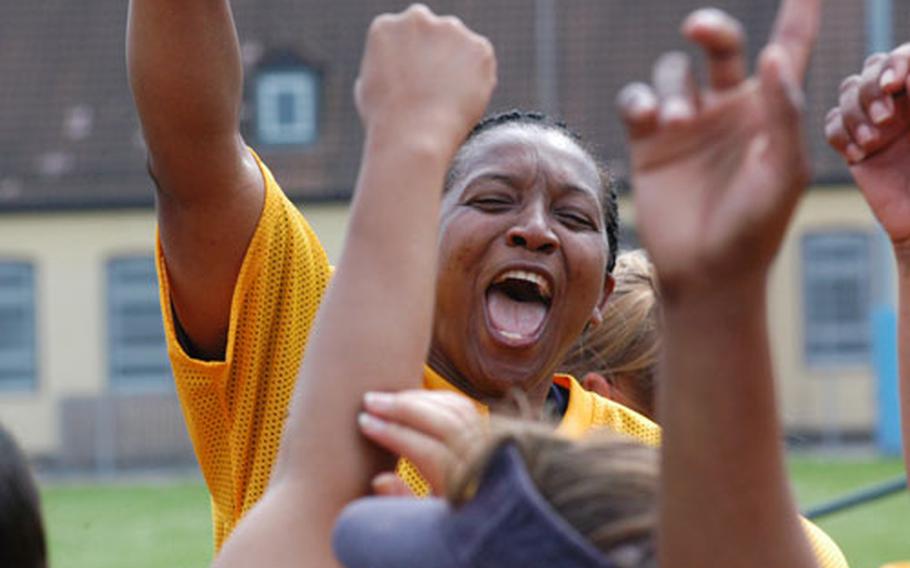 Heldelberg shortstop Tiffany Collins celebrates after the Lady Generals won the U.S. Army Europe Community-Level Softball championship.