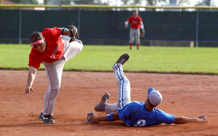 Ramstein catcher Sal Vieyra, right, breaks up a double play Saturday by forcing Kaiserslautern second baseman Jeramy Alponte off the bag and into the air. Alponte got the throw off, but not in time to get another out at first. Ramstein went on to win the game 32-12.