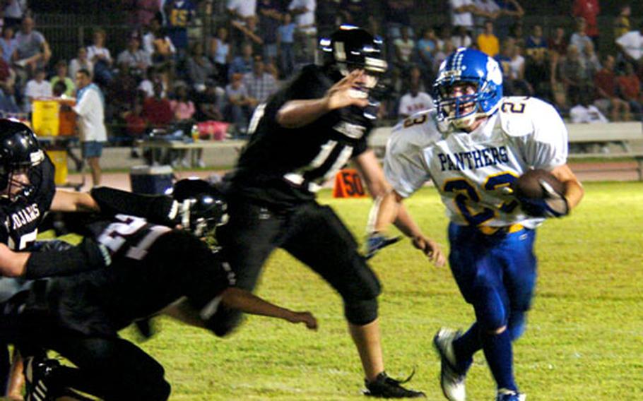 Yokota’s Scott Monahan evades Zama defenders.