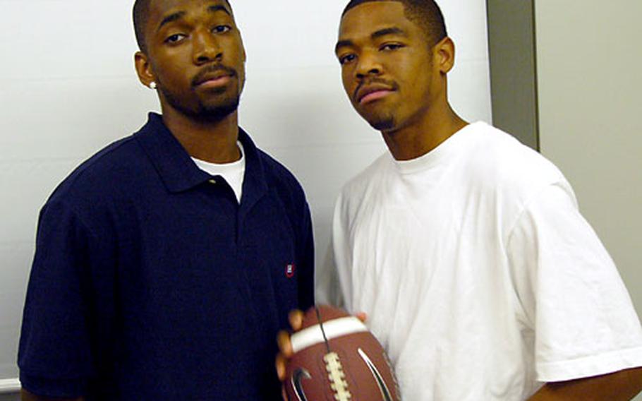 Tim Battle, left, a senior quarterback, and his brother C.J., a junior running back, left Giessen High School last November to attend Mount Vernon High School in Alexandria, Va., but returned to live with their mother and partake in the camaraderie that comes with playing football at a smaller school.