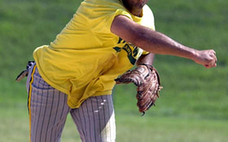 Yellow Box shortstop Jeff Stark throws to first base against the Yokota Samurai of Japan during Monday’s men’s championship game. Yellow Box routed Yokota 29-2.