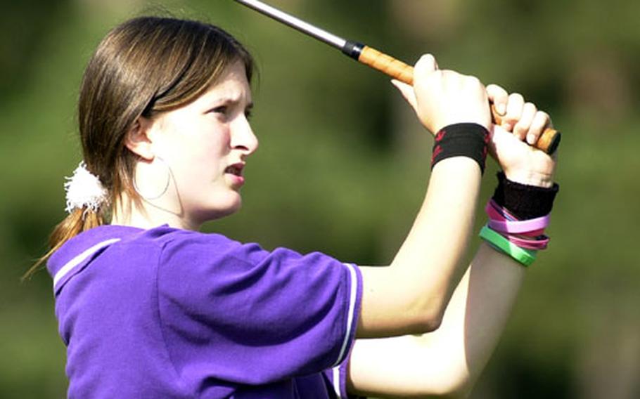 Kayle Helton of Würzburg watches her tee shot on 17 during the opening round of the DODDS championship tourney in Wiesbaden on Thursday. Helton is tied for the lead with Hanau&#39;s Hope Fotter, with 16 Stableford points going into Friday&#39;s final round.