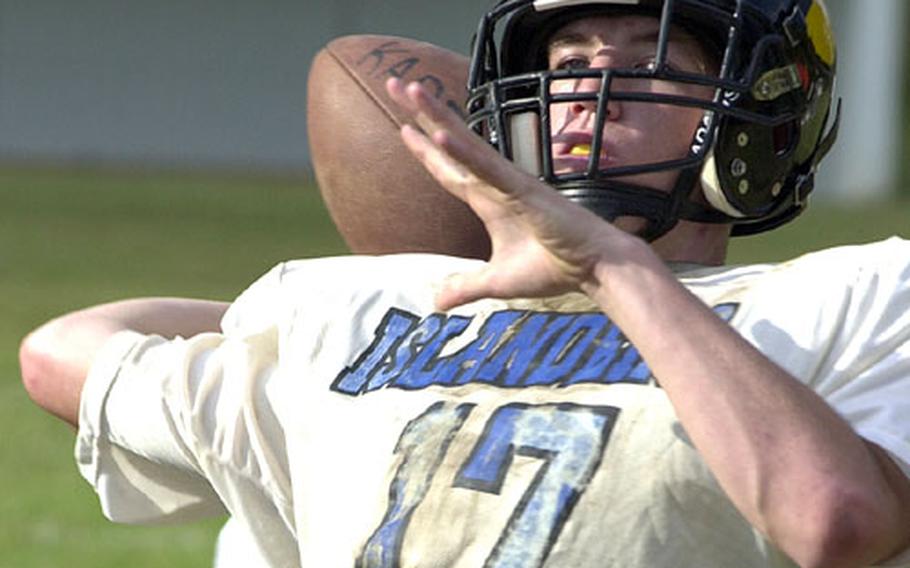 Kadena quarterback Kenny Bergstrom goes through his paces during Thursday practice at Upper Field, Kadena High School, Kadena Air Base, Okinawa. The Panthers visit the Kubasaki Dragons at 7 p.m. Friday in the third game of the best-of-three Okinawa Activities Council football series.