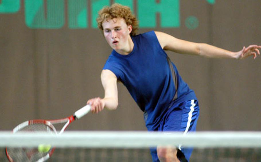 Bitburg&#39;s John Pendergrass reaches for a return from ISB&#39;s George Dufournier in their Friday quarterfinal match, which Dufournier won 4-6, 6-2, 6-0.