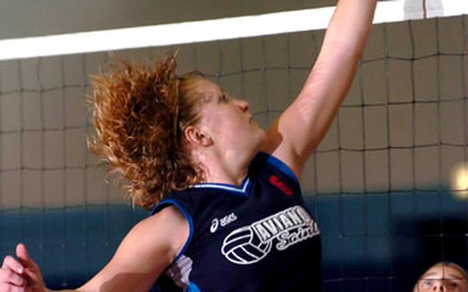 Raymond T. Conway / S&S Aviano’s Jessica Corder hits an attempt against Black Forest Academy during the championship game of the DODDS-Europe Division II volleyball final in Ramstein, Germany, on Saturday. Aviano defeated BFA 25-23, 25-7, 25-8 to win the title.
