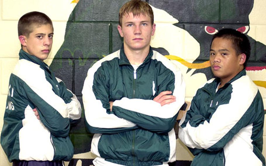 From left, Jack Abate (101 pounds), Steve Courtney (148) and Matt Maza (122) won Far East wrestling titles last season, and all three juniors return for individual freestyle and dual-meet team champion Kubasaki.