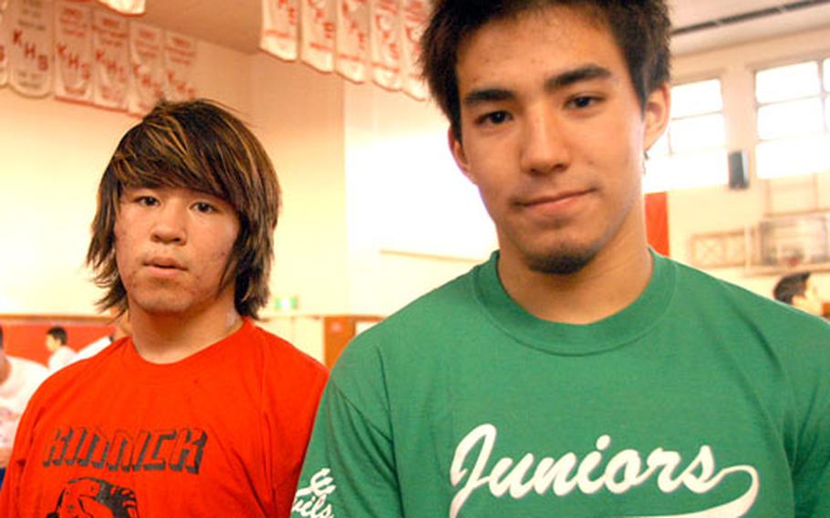 Seniors and defending Far East individual champions Yamato Cibulka (left, 158 pounds) and Kenji Doughty (141) are key returnees for the Nile C. Kinnick Red Devils.
