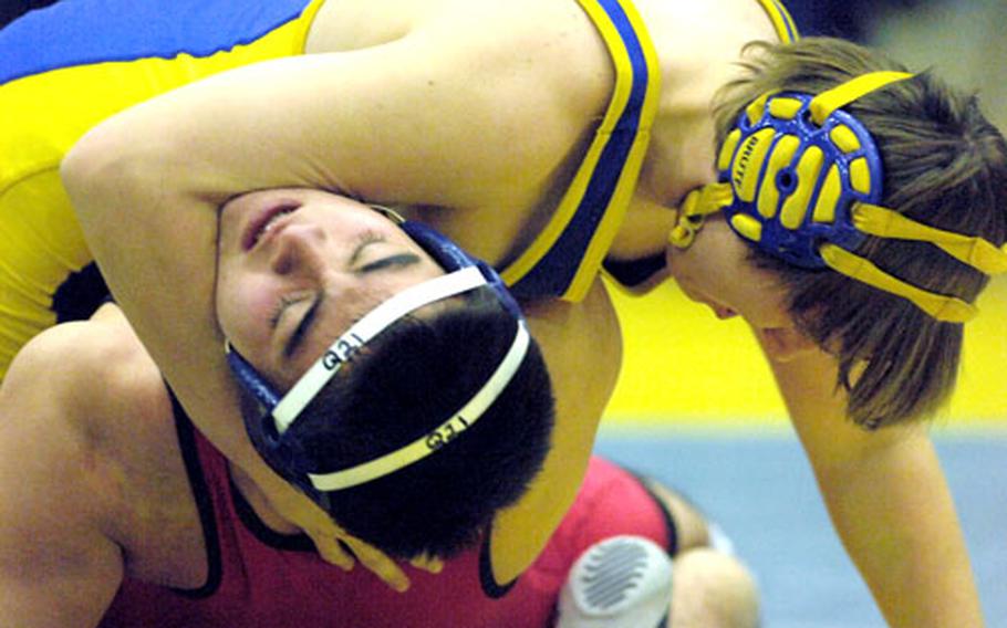 Robert Rodell, on top, of Yokota pins Alex Crany of St. Mary&#39;s during the 129-pound bout in Wednesday&#39;s dual meet at Yokota. Rodell pinned Crany in 3:16 as Yokota beat St. Mary&#39;s for the first time since 1998-99.