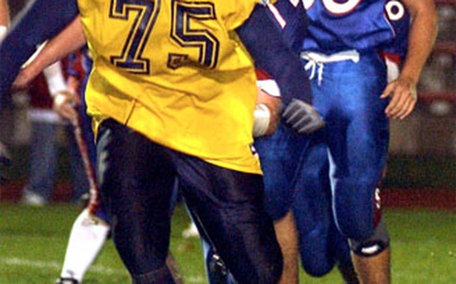 Heidelberg’s Brandon Simmons follows a play on defense during the Division I championship game in Baumholder in November. Simmons was named to the 2005 DODDS All-Europe team on offense and defense for the second straight year.